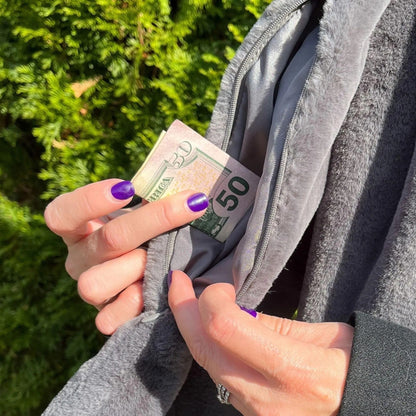 Scarf with hidden zipper pocket